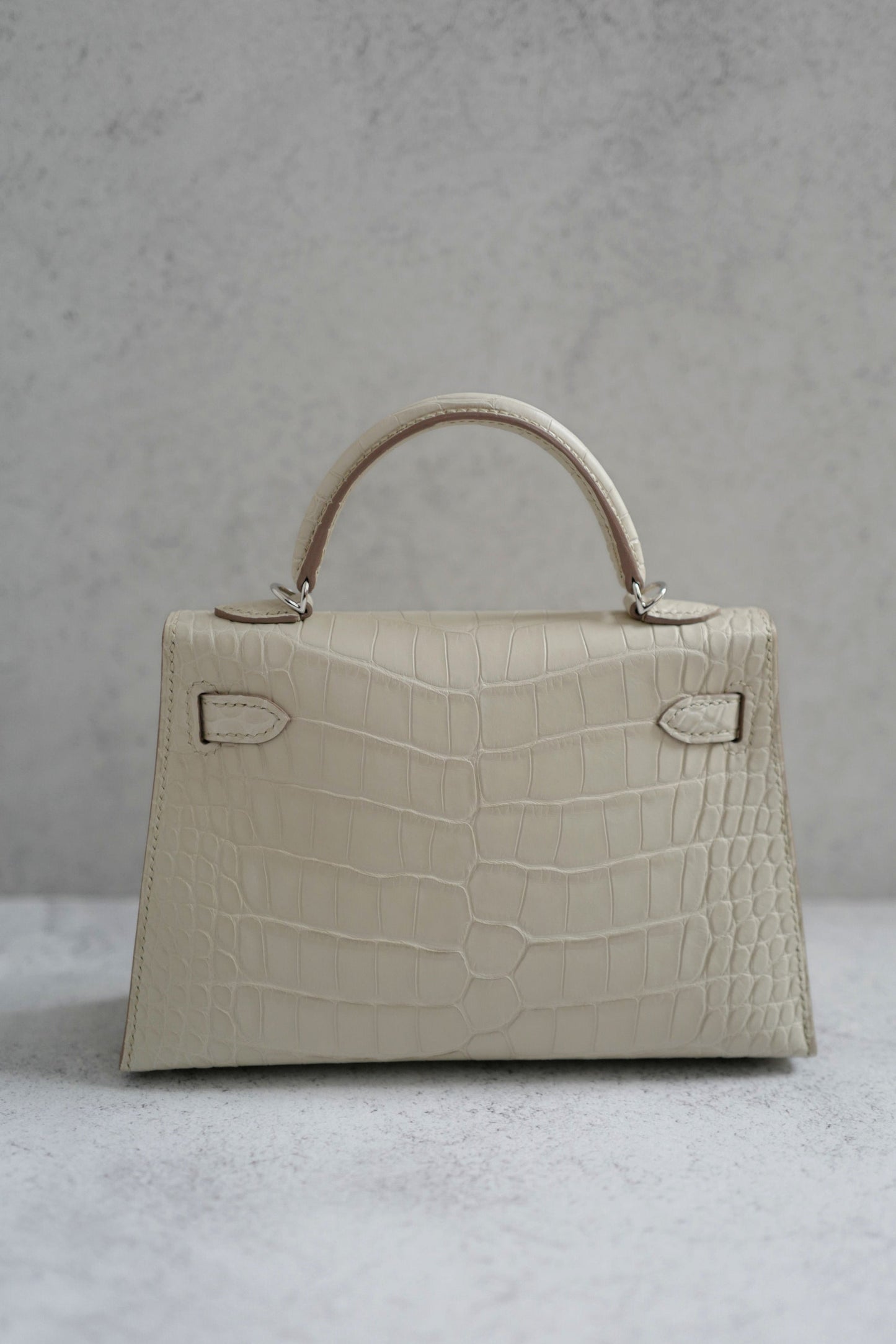 BNIB Hermès Mini Kelly 20 Beton Matte Crocodile with Palladium Hardware Stamp K