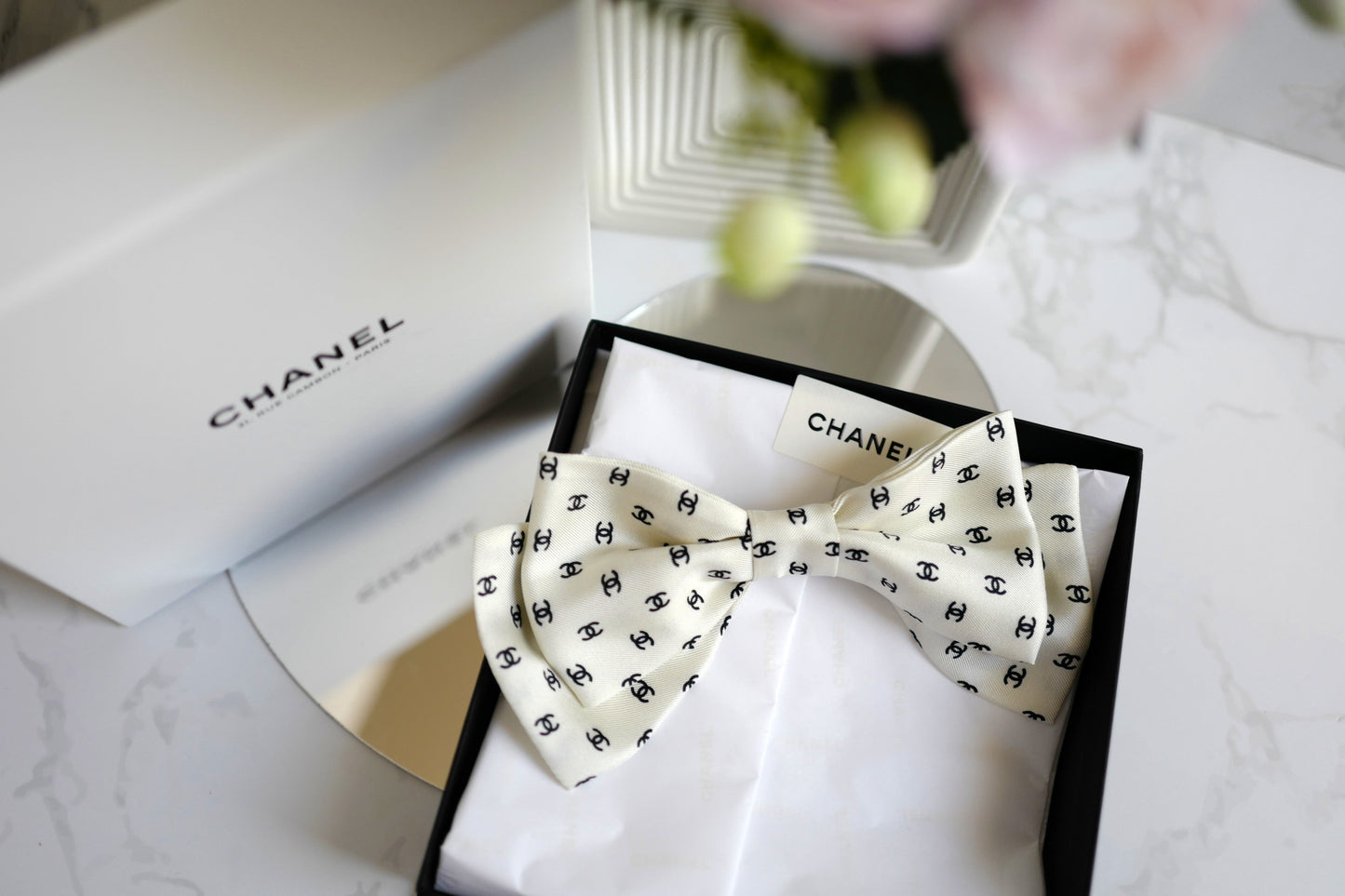 Chanel 2024/2025 Cruise 24C Bow Barrette White with Black CC Print