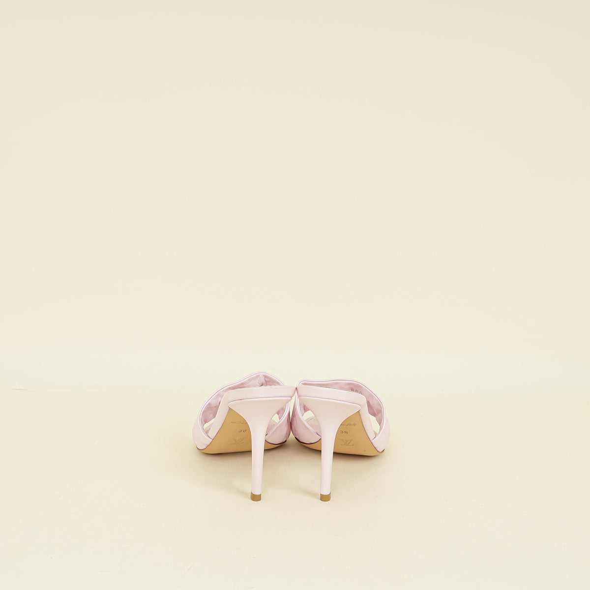 Louis Vuitton Light Pink Monogram Embossed Revival Mules 38