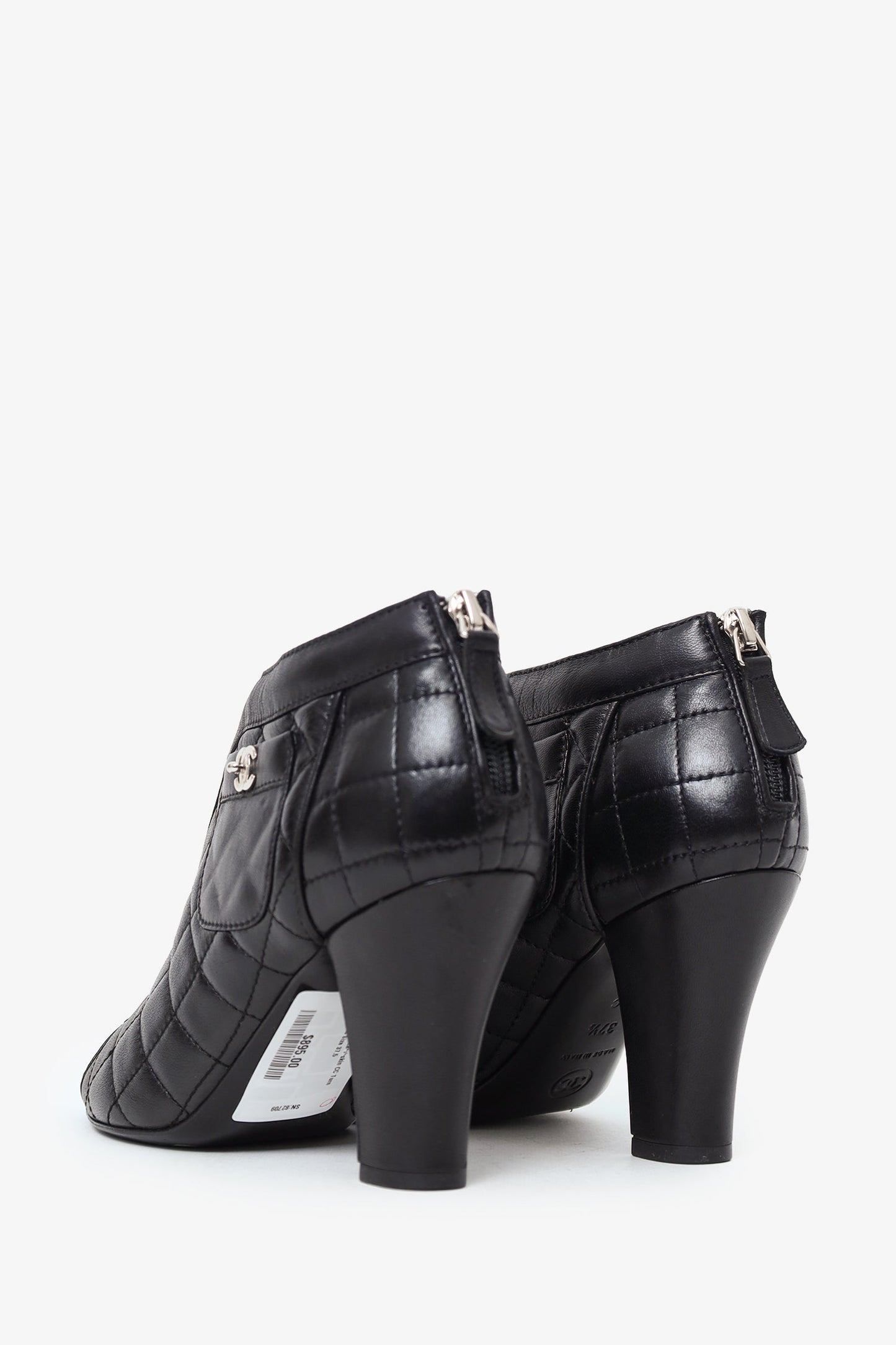 Pre-Loved Chanel™ Black Quilted Lambskin CC Turn Lock Ankle Boots Size 37.5
