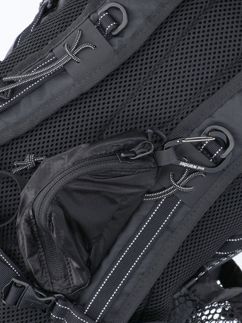 And Wander Structured Black Bag With Minimalist Design