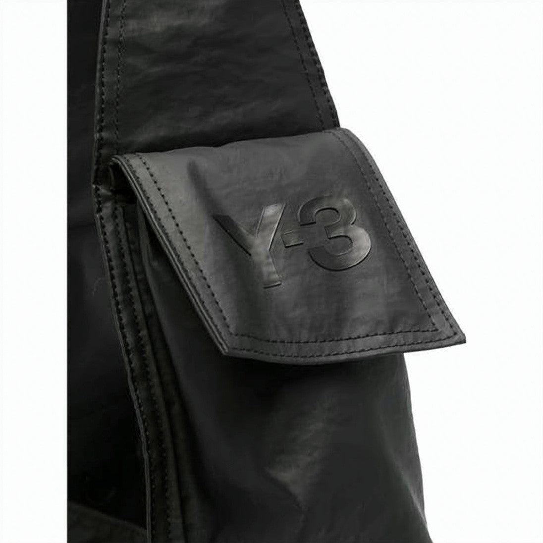 Y-3 Black Crossbody Bag With Embossed Branding And Folded Strap