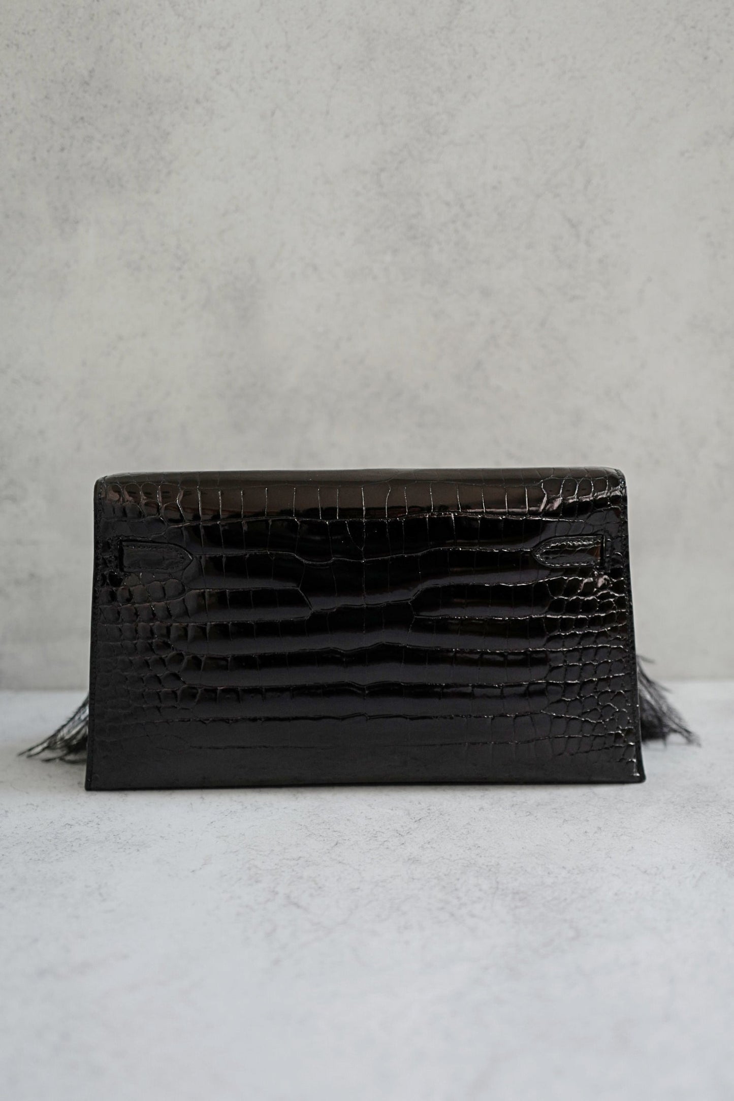 Hermès Kelly Elan Folie Clutch Black Porosus Crocodile & Feather Noir with Gold Hardware