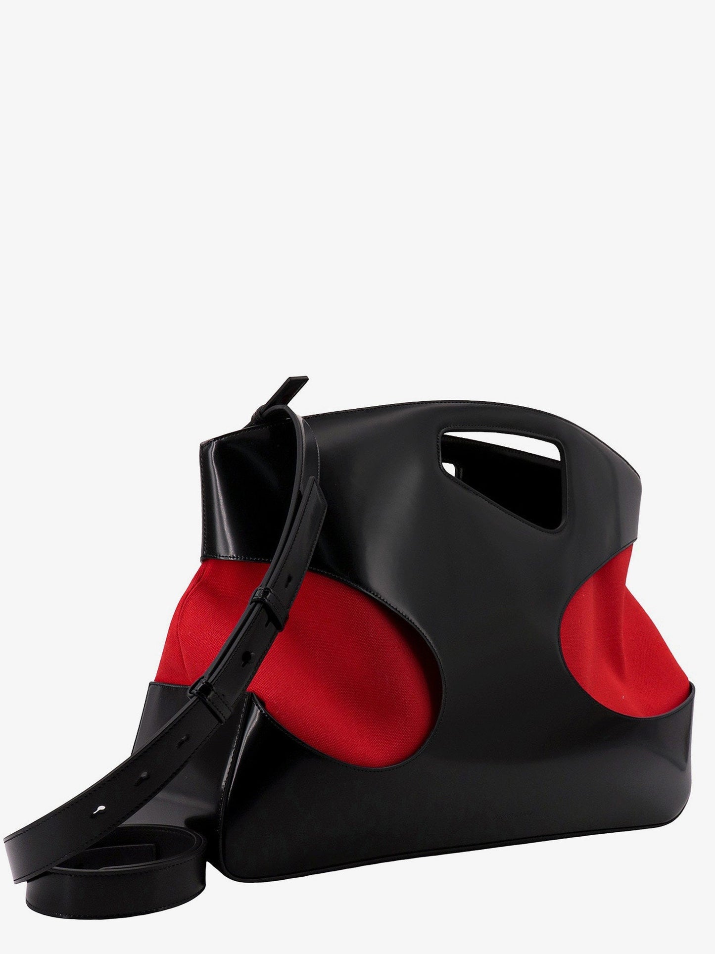 Leather and canvas handbag with cut-out details