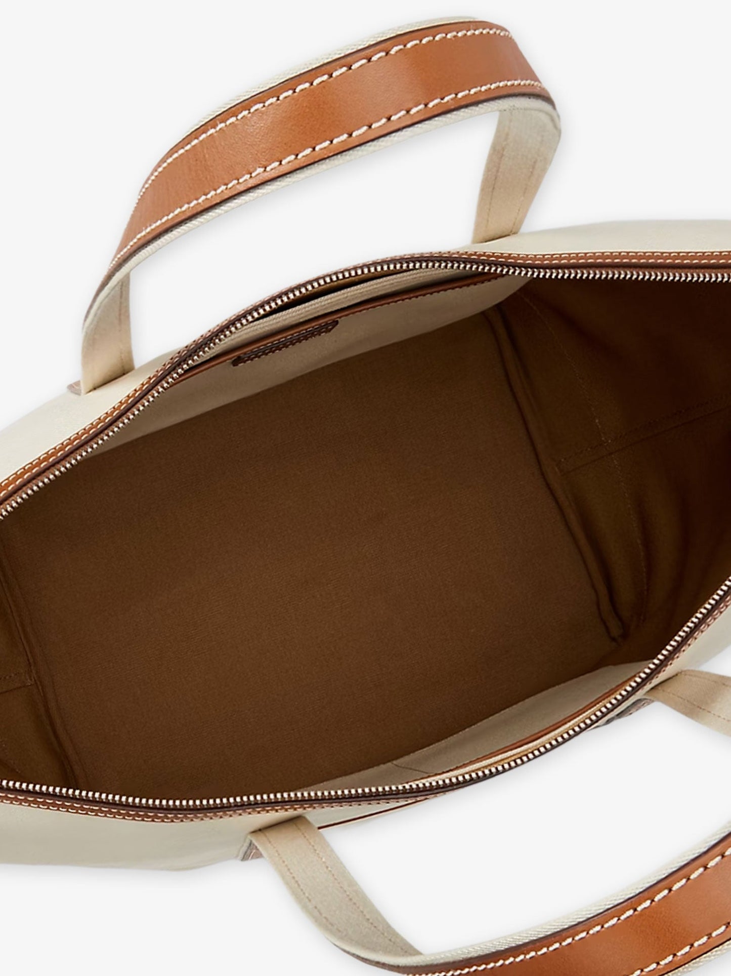 Canvas travel bag with leather profiles
