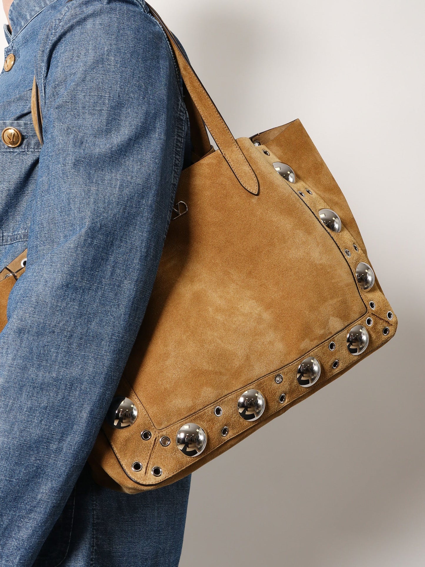 Suede shopping bag with metal logo