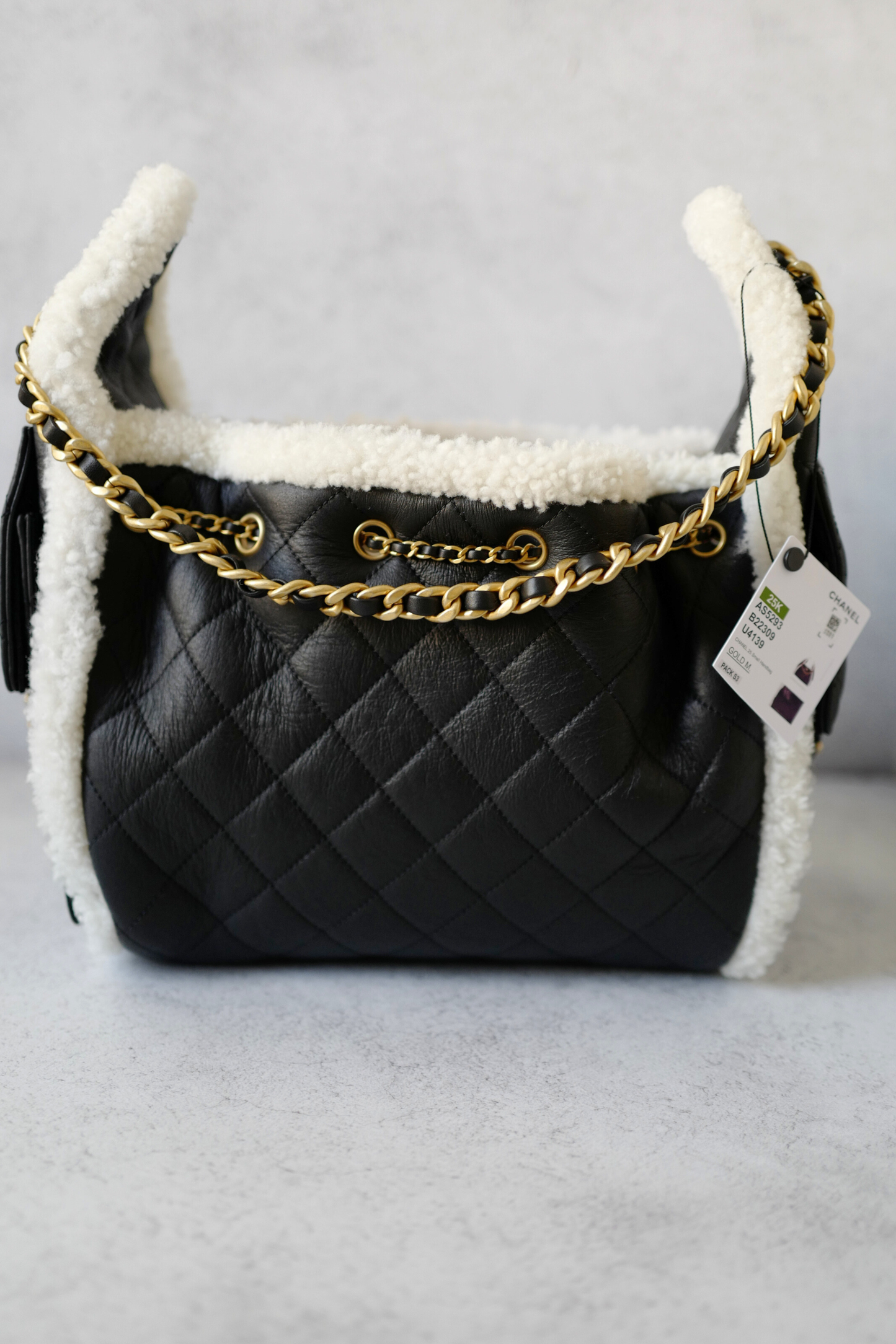 Chanel 25K Small Hobo Bag Black Calfskin with Shearling Trim Gold Hardware .