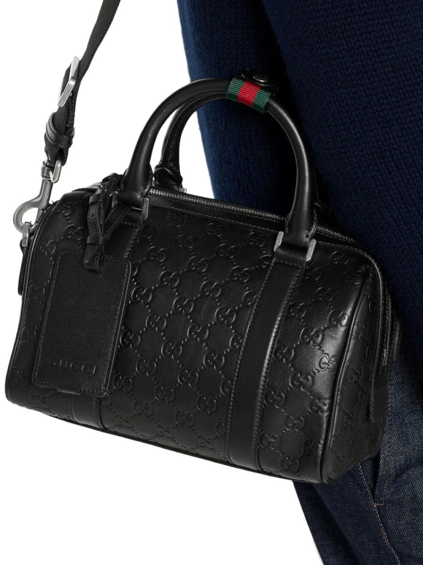 Gucci Cylindrical Black Bag In Embossed Calfskin