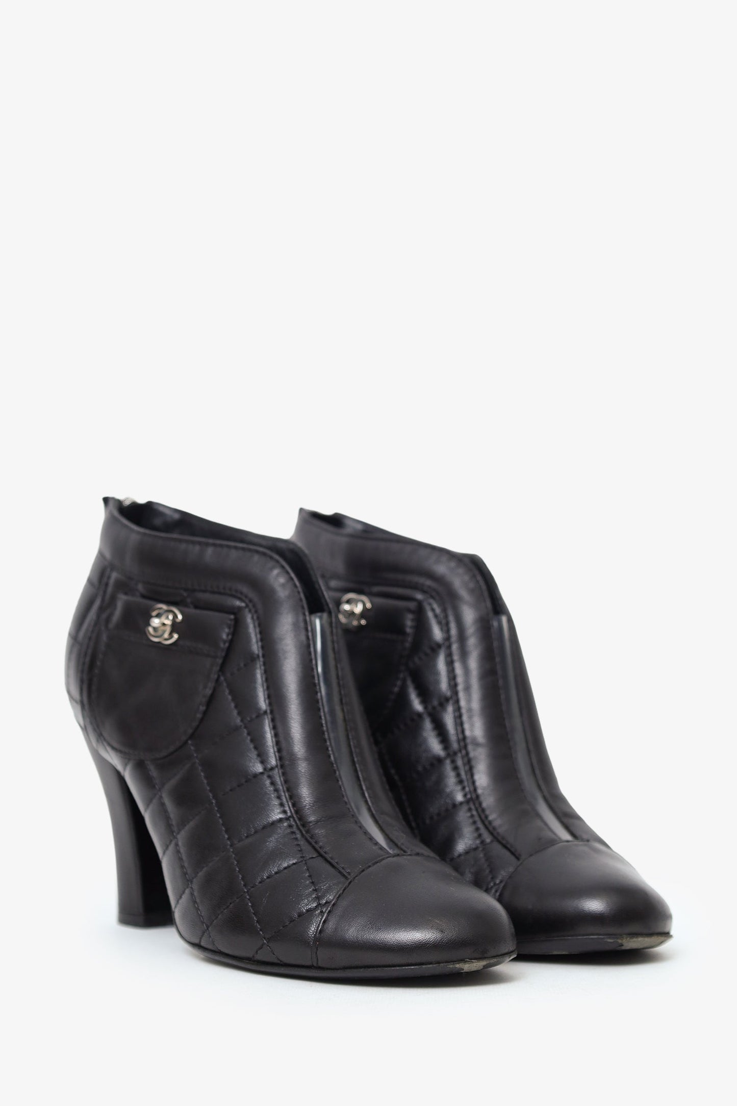 Pre-Loved Chanel™ Black Quilted Lambskin CC Turn Lock Ankle Boots Size 37.5