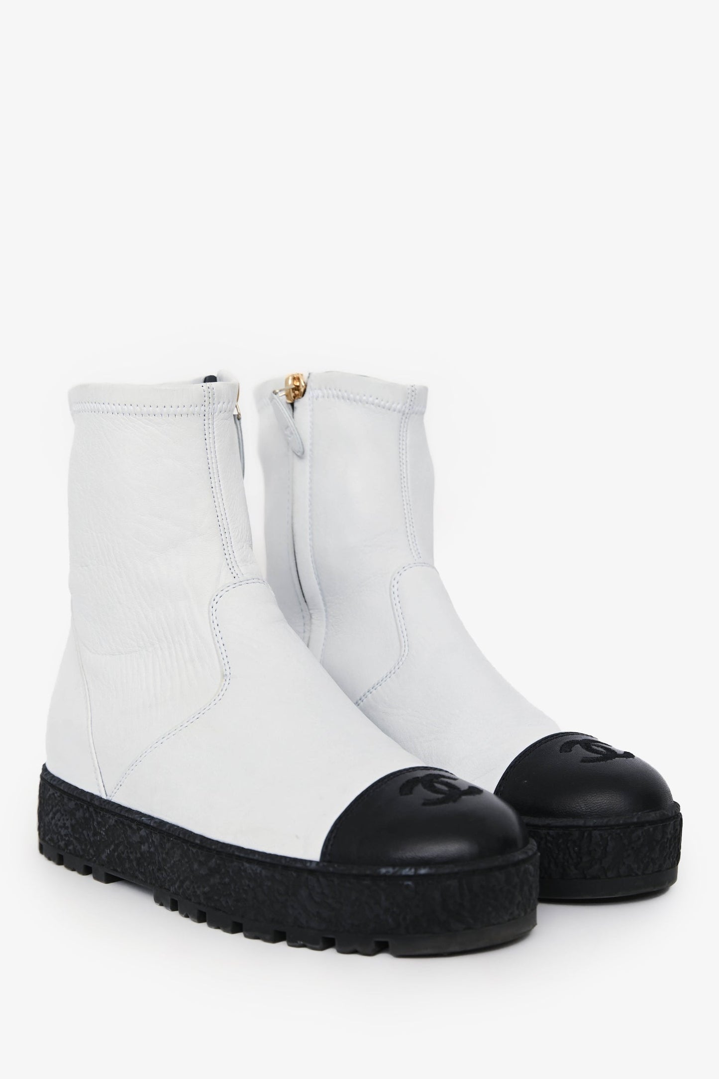 Pre-Loved Chanel™ 2022 White/Black Leather CC Logo Toe Cap Chelsea Boots Size 36.5