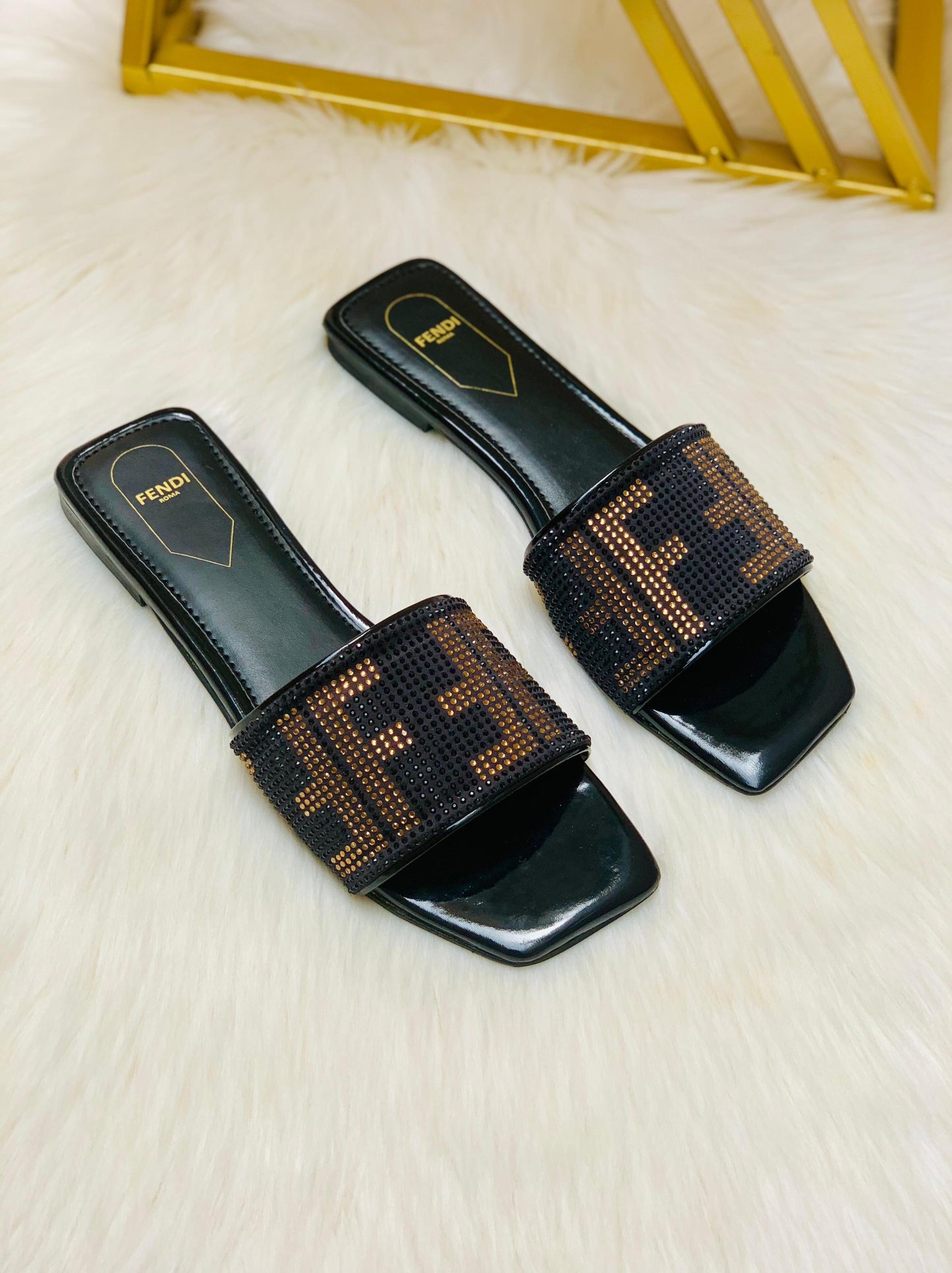 FENDI Stone Women Slippers – Elegant & Stylish Comfort (Black/Gold)