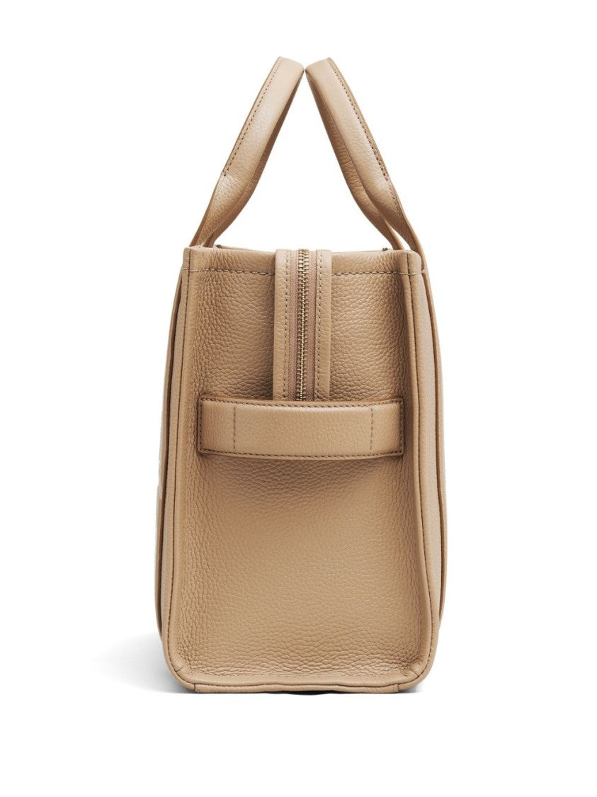 Marc Jacobs Textured Leather Tote Bag With Logo Print And Versatile Carry Options