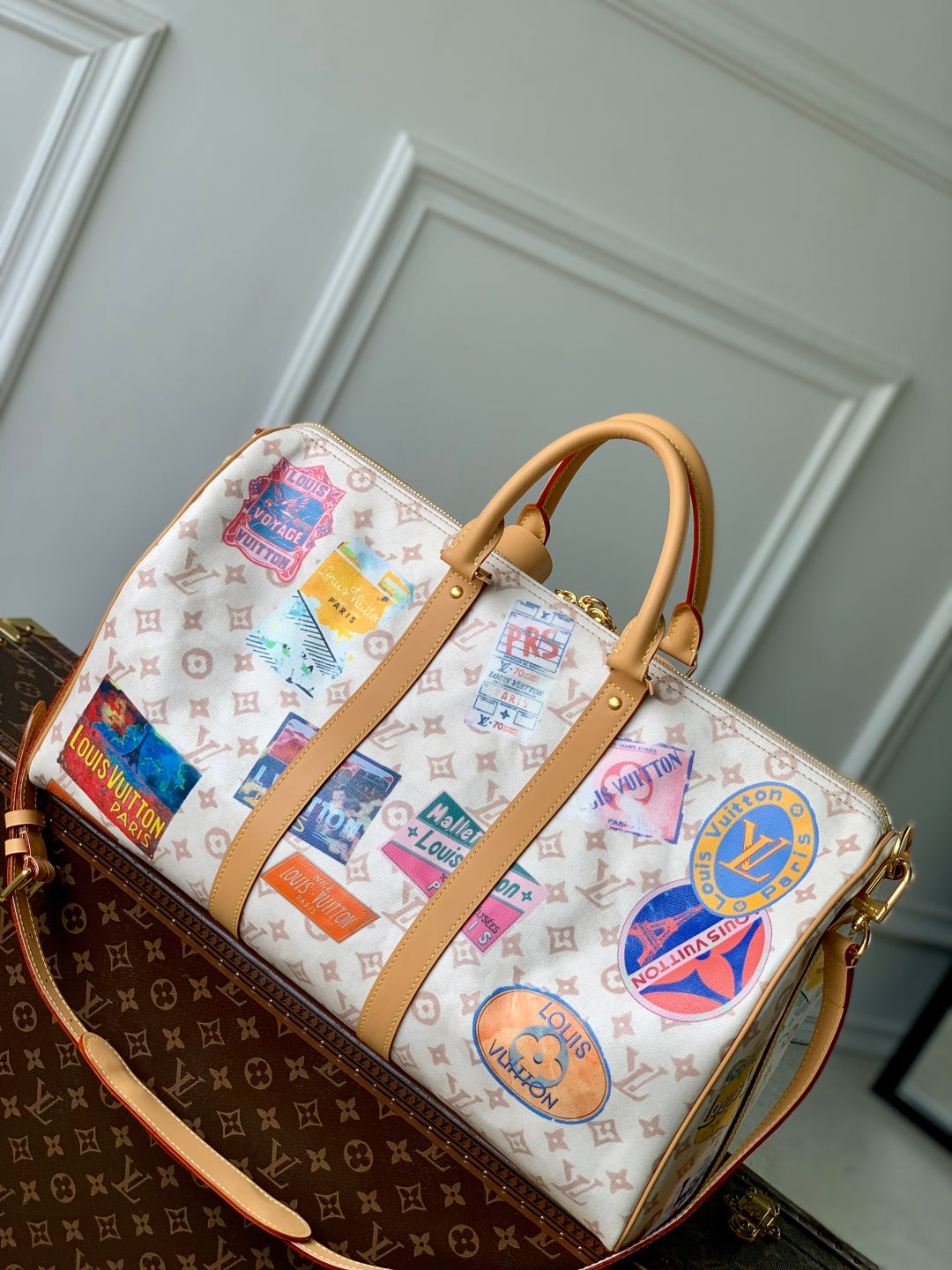 KEEPALL BANDOULIÈRE 45 IN WHITE MONOGRAM DUNE CANVAS AND CALFSKIN
