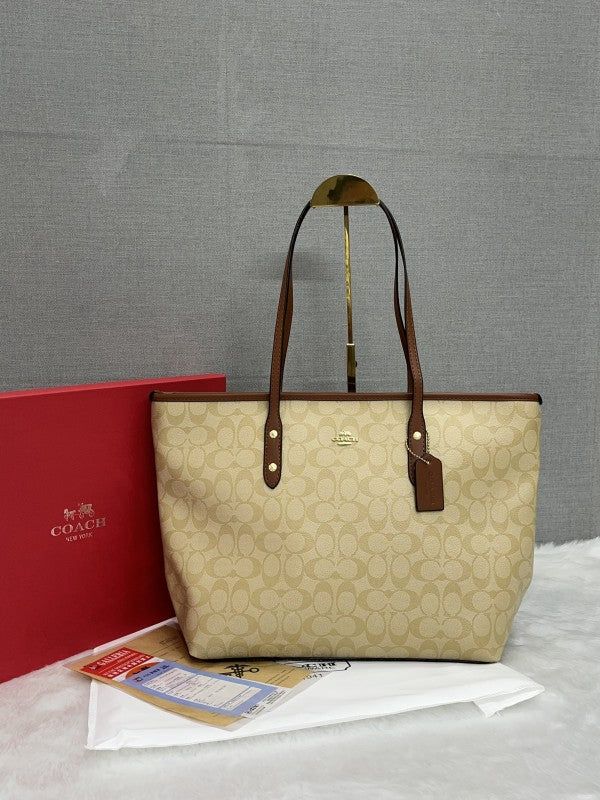C-O-A-C-H CITY TOTE BAG IN SIGNATURE CANVAS – Women Bag (Off White)